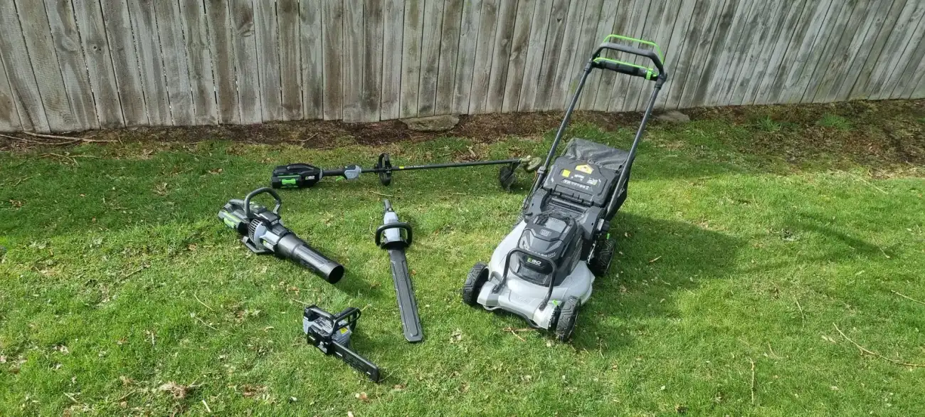 Dunedin Mowing's full line-up of EGO electric lawn care equipment on the grass